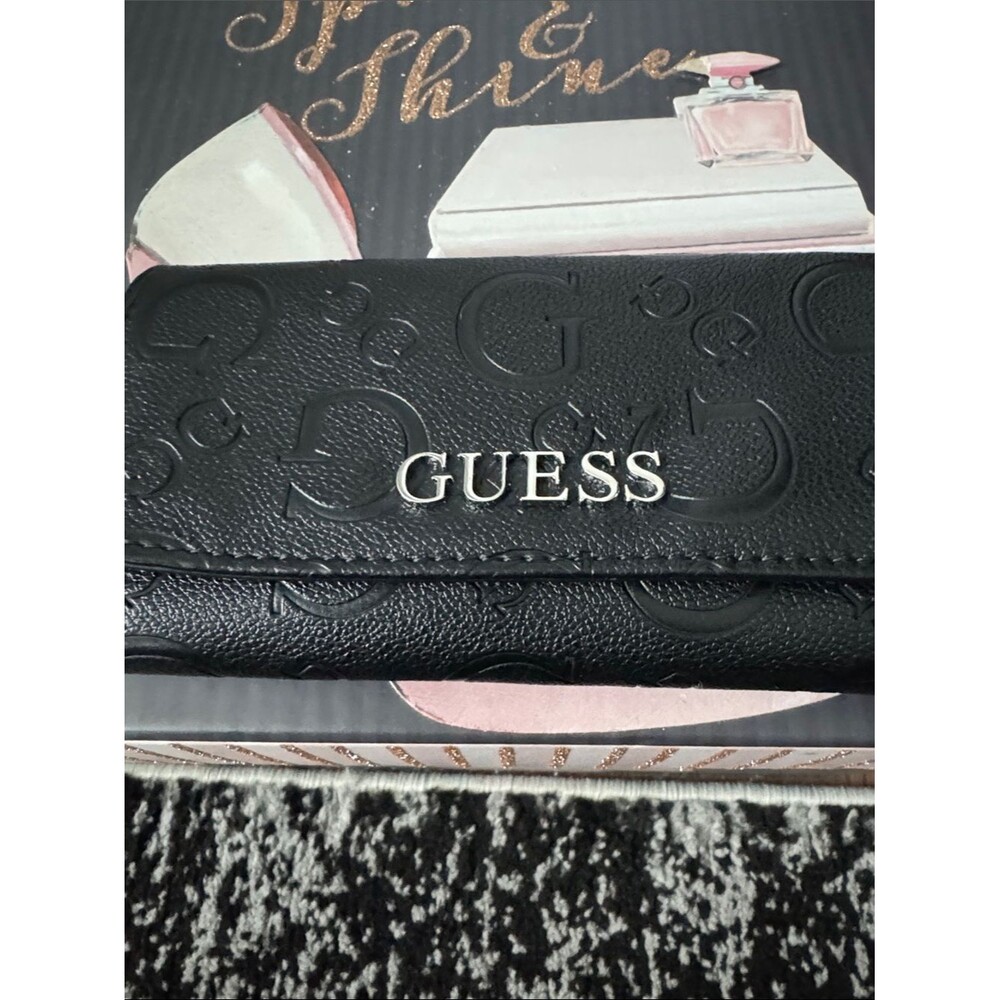 GUESS Black Embossed Logo Foldover Wallet with Silver Lettering